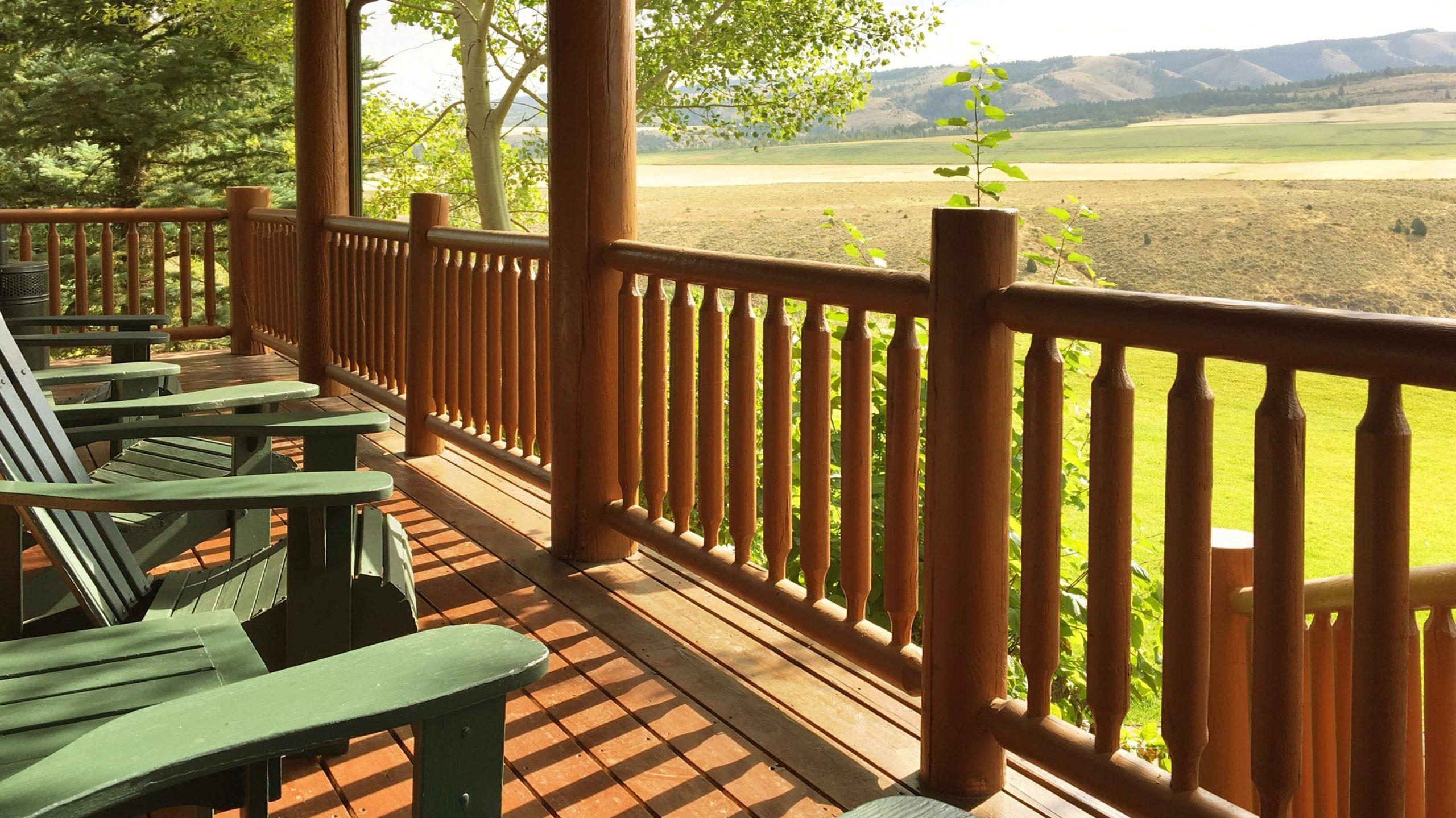 View of Lazy Triple Creek Upland Bird Hunting Ranch from Adirondack Chairs on Lodge Deck